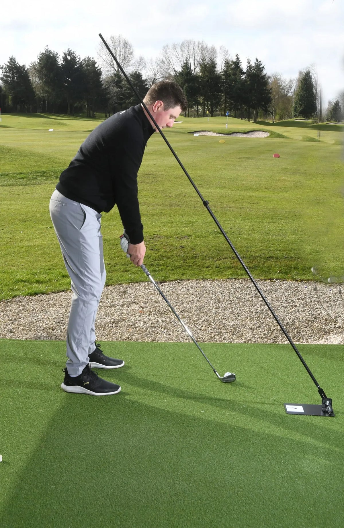 The Swing Plate with Extendable Twist Lock Golf Training Pole